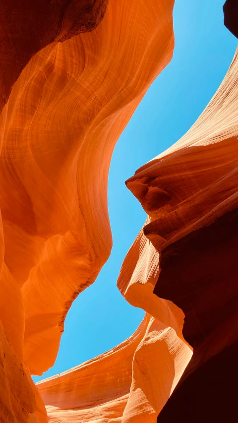 a view of the light from the top of a rock