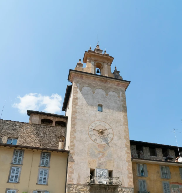 there is a clock tower in the middle of a city