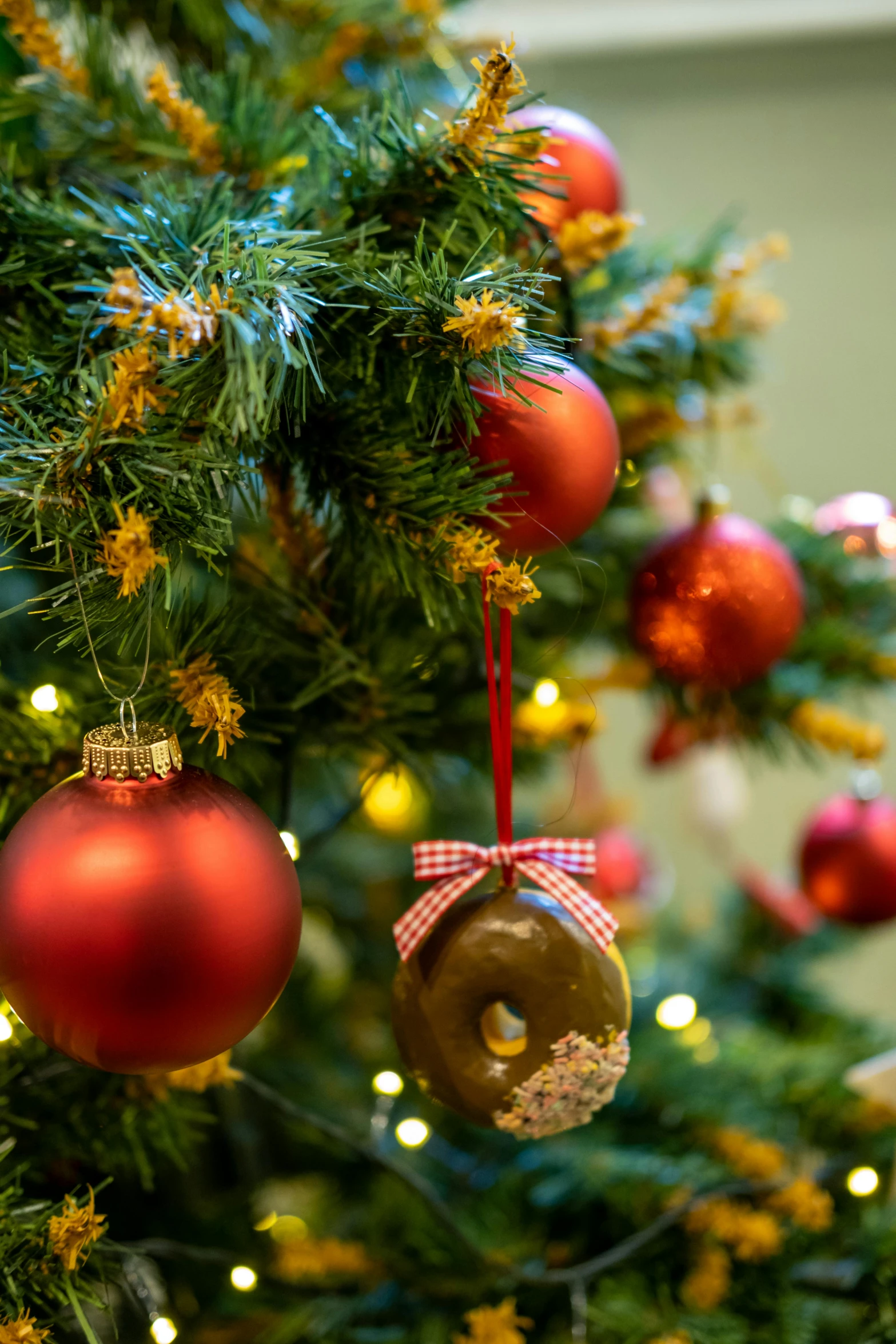 a close up of some ornaments on a christmas tree