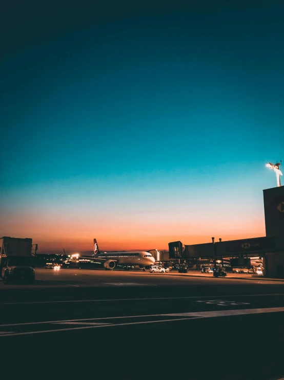 the sunset light shines brightly over an airport