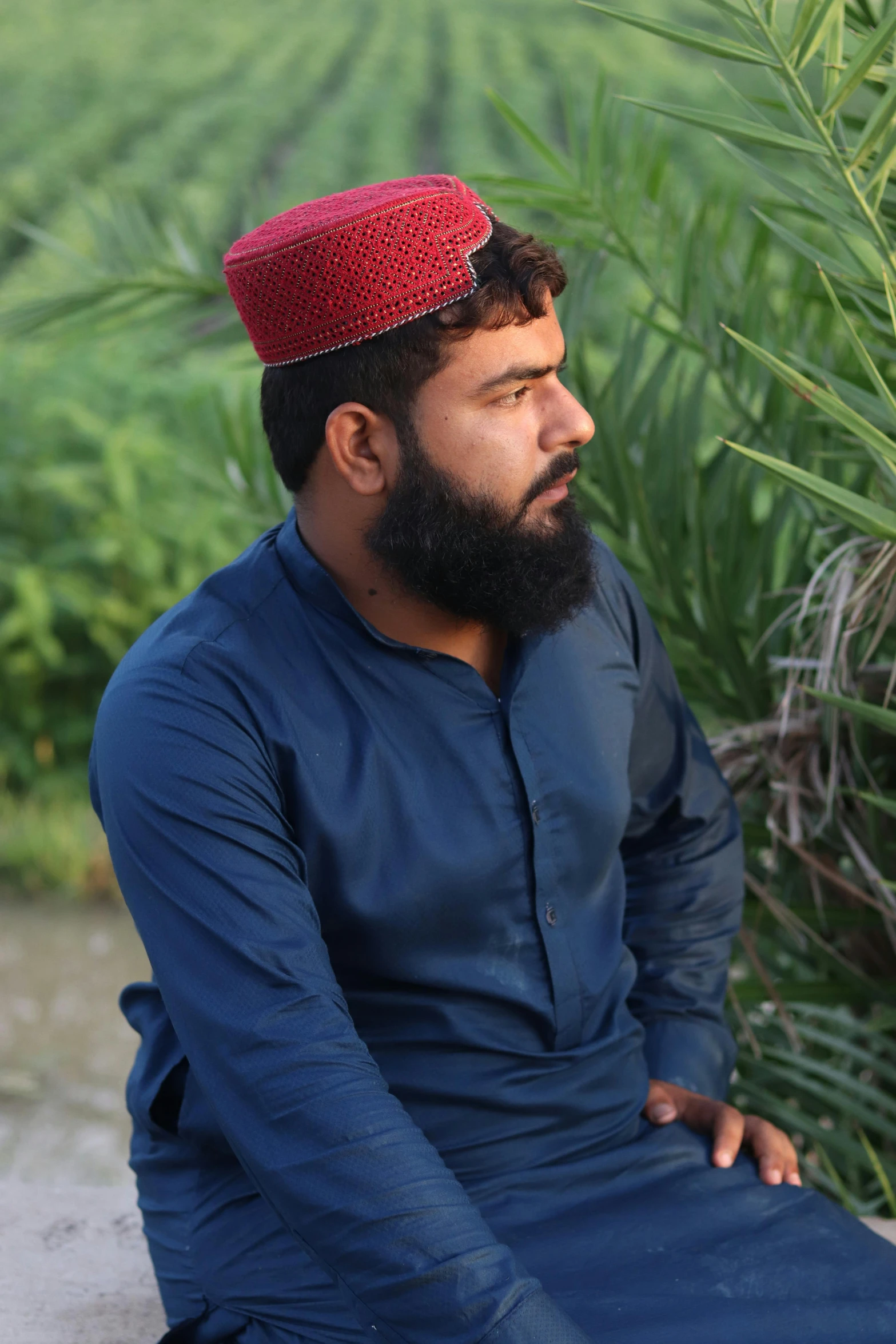 an image of a man that is wearing a red hat