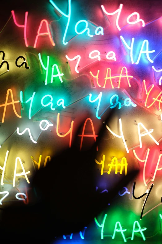 a bright image of words and neon signs