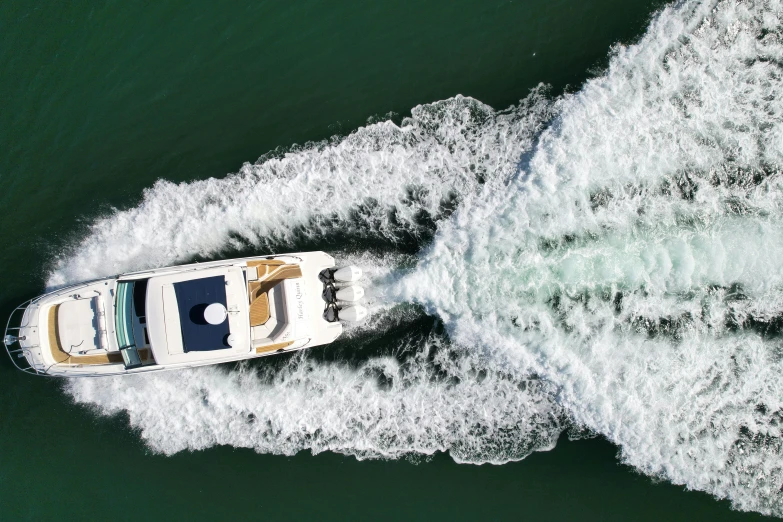 aerial view of a motor boat with wake