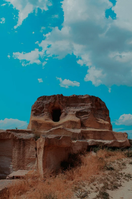 the ruins on the side of the road were built to look like mud