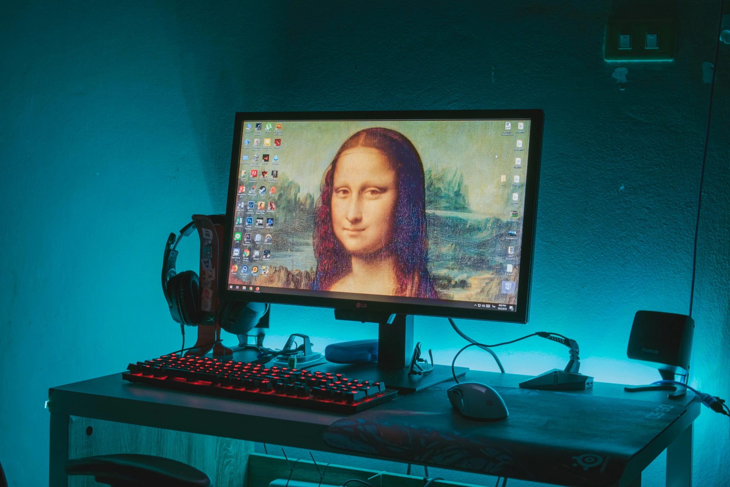 a computer screen sitting on top of a desk