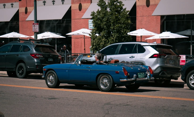 a car parked near a building on the street