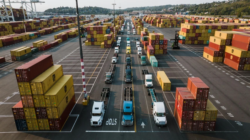 shipping container terminal with containers parked next to it