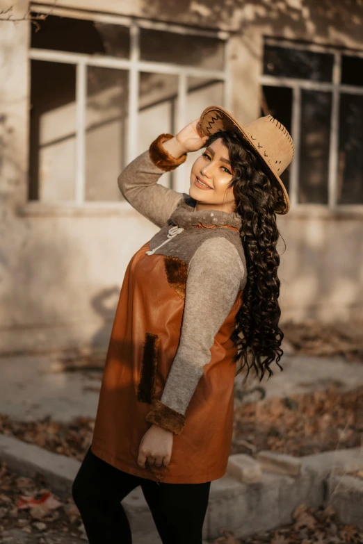 there is a young woman posing on the steps