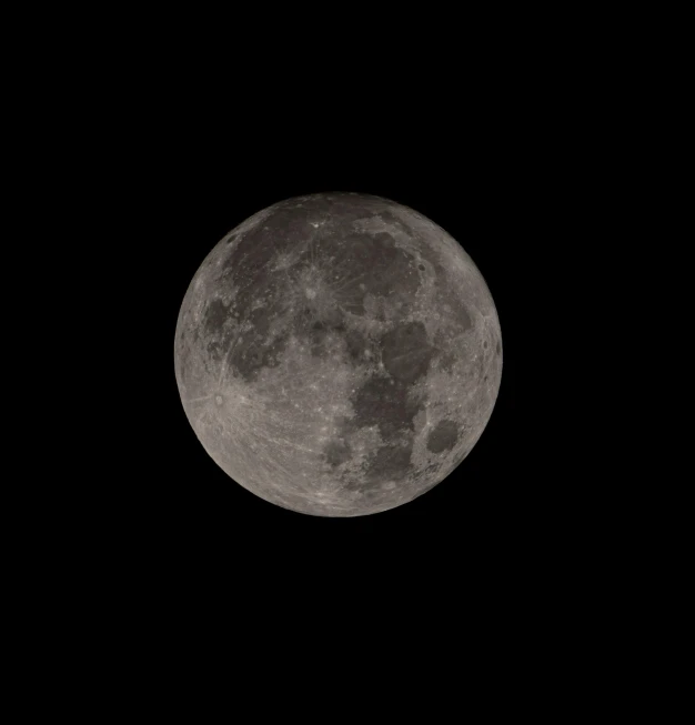 a view from below of the full moon