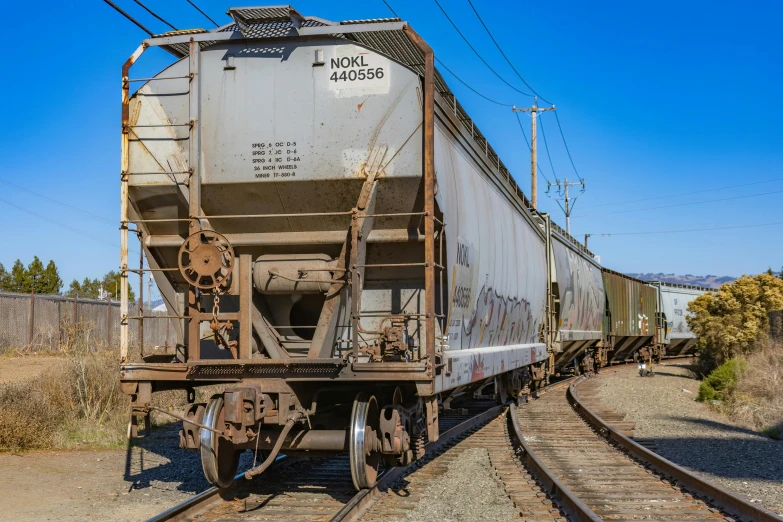 a train that is traveling down some railroad tracks