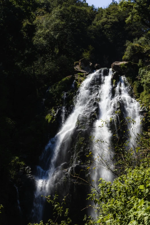 some very pretty waterfalls in the middle of the woods