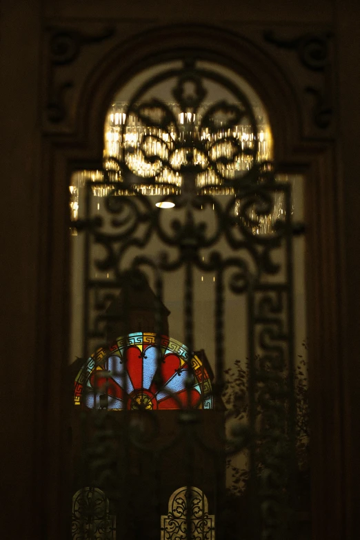 a stained glass window is shown in a room