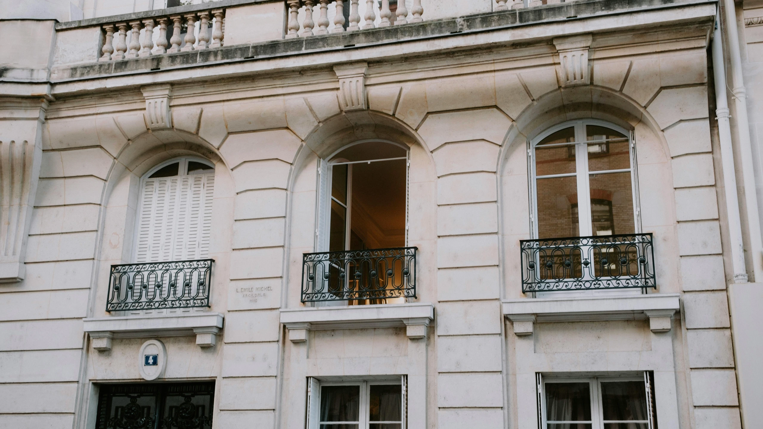 a building with many windows and doors