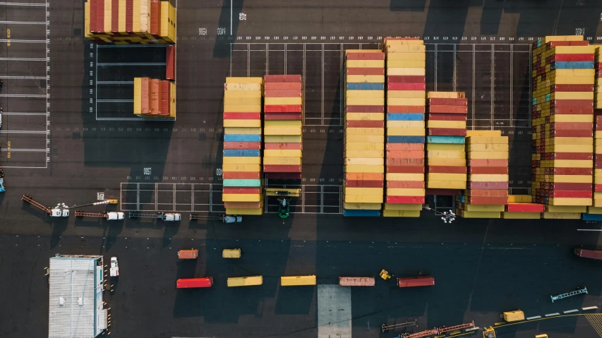 several large shipping containers that are stacked next to each other