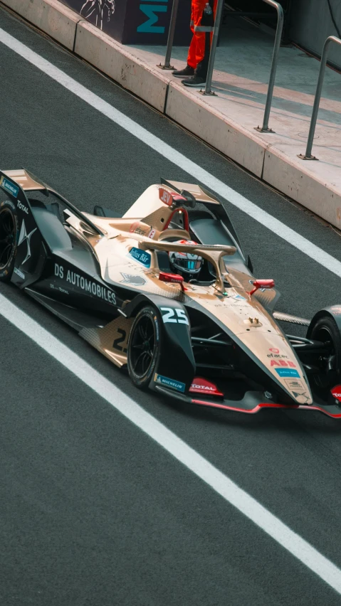 a racing car in a race driving on a city street