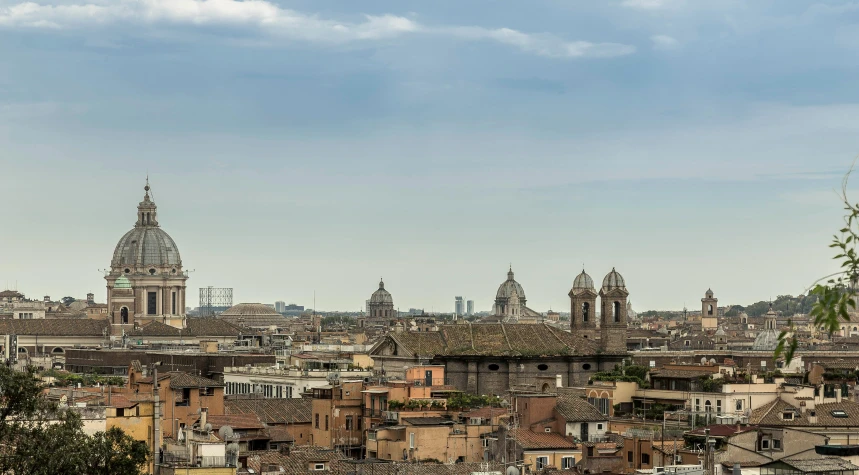 this is a picture of some buildings and towers in the background