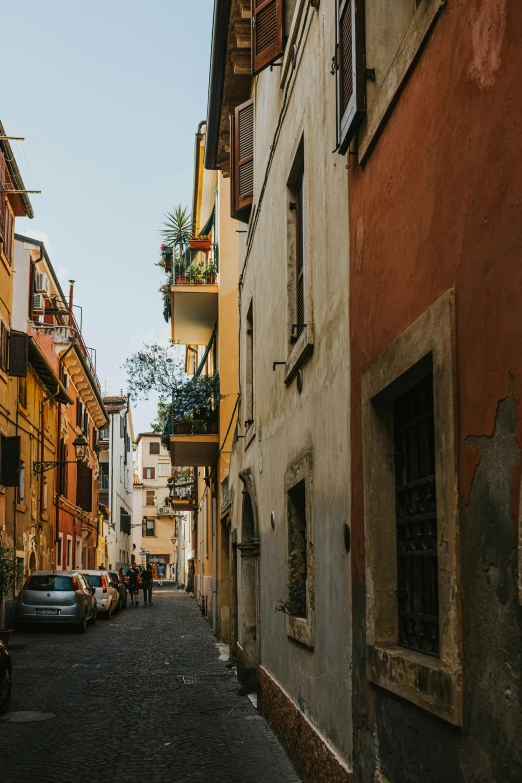 an old city street with buildings lining it