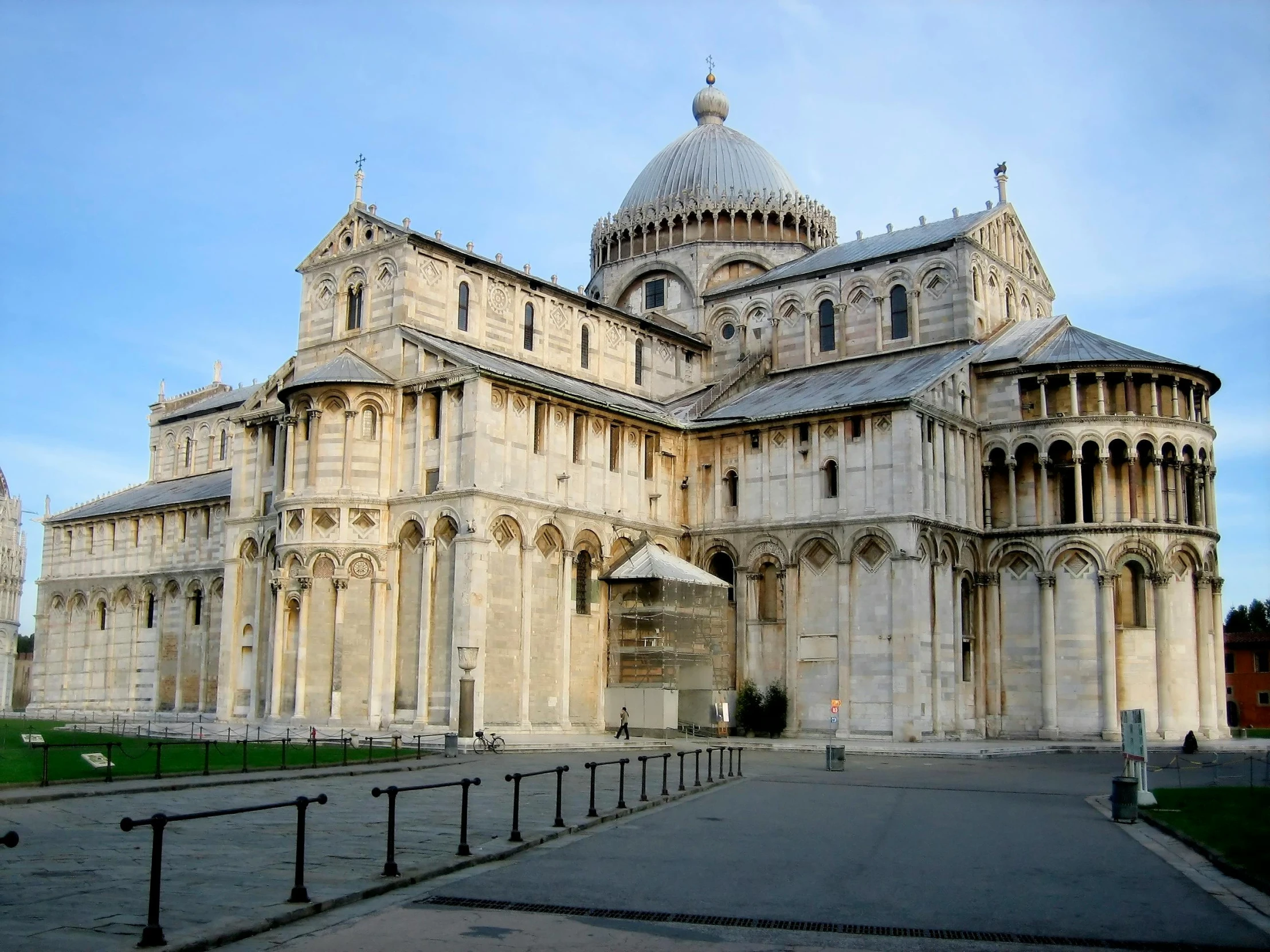 the large cathedral has multiple arches and bell towers