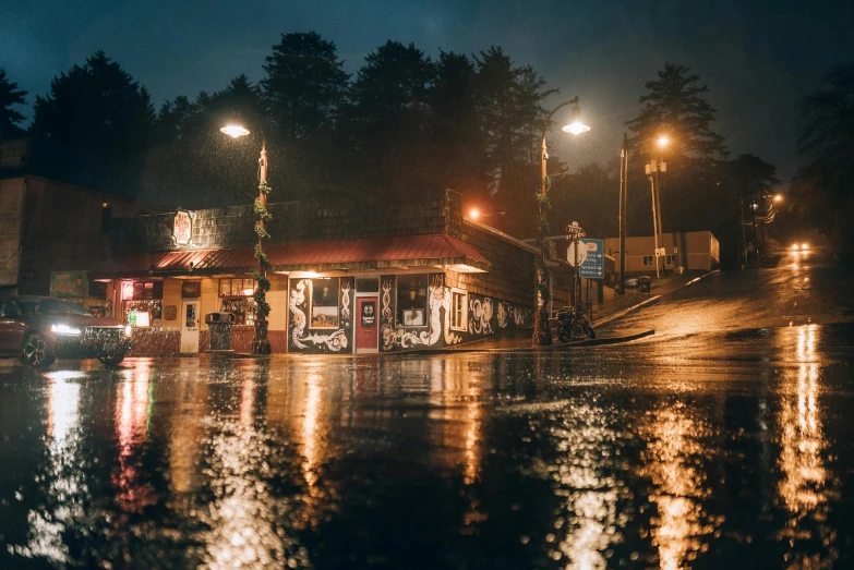 the lights are on at a gas station in the dark