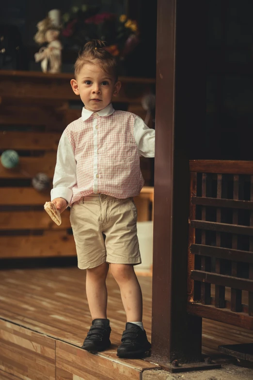 a  stands on a wooden step