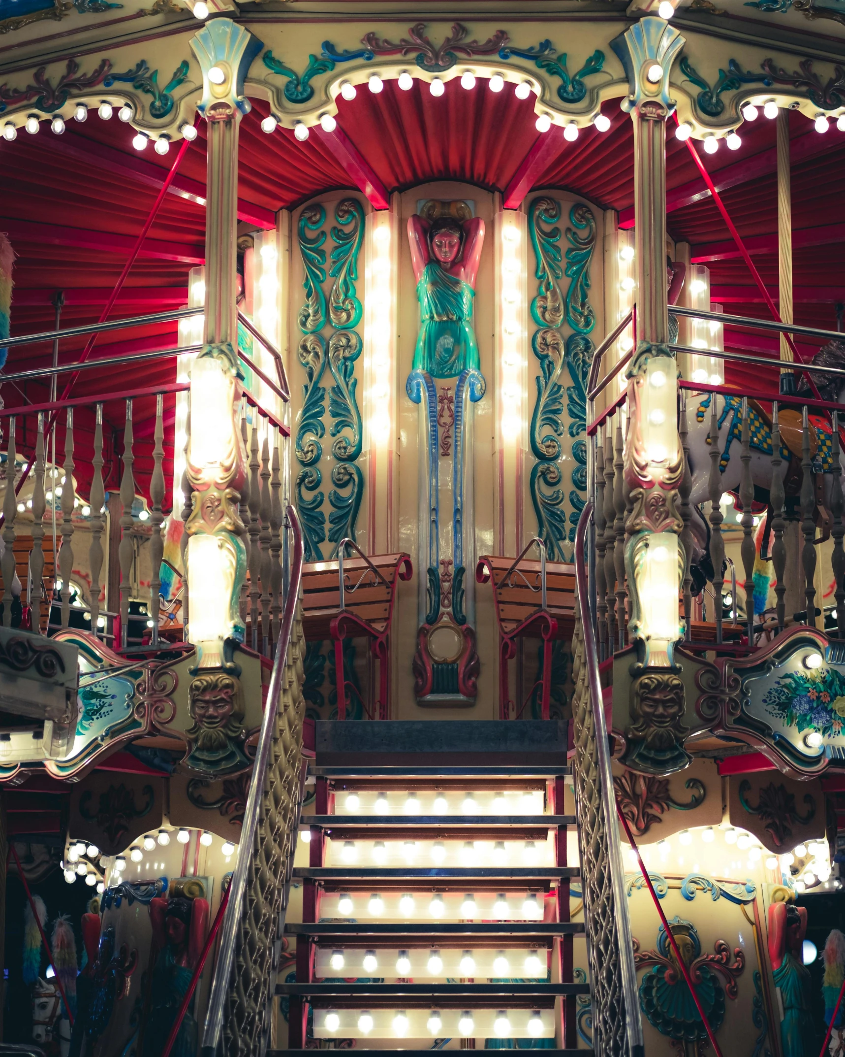 an old - fashioned carousel staircase leads to the lights