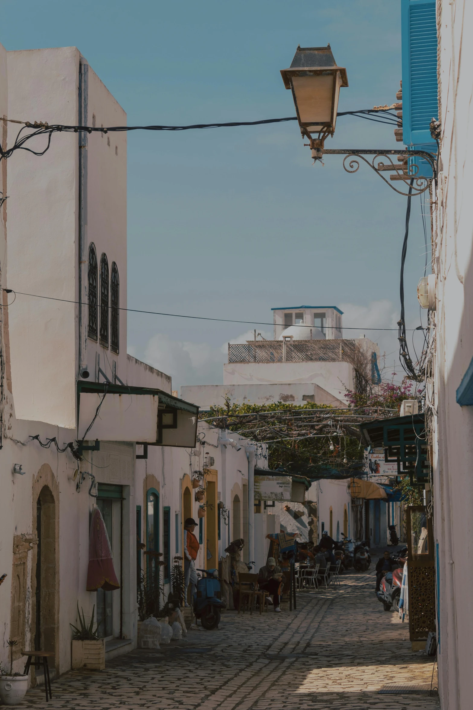 a street with many things that are on the sidewalks