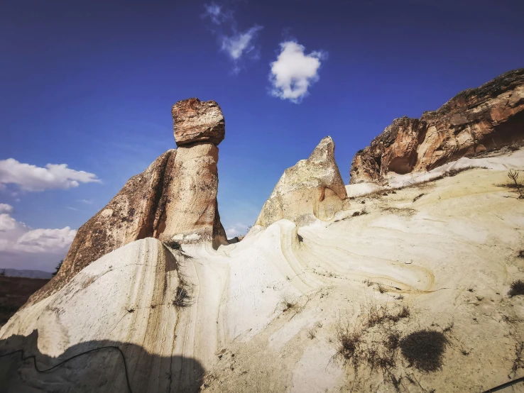 there are three very large rocks in the desert