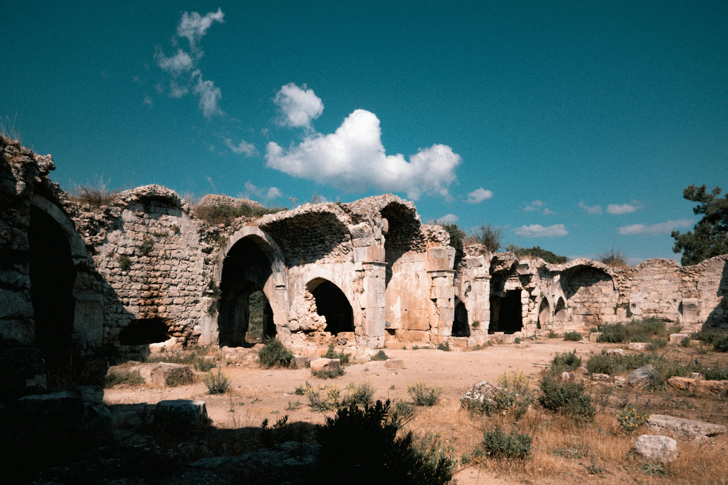 a view of the ruins that houses a church in desert