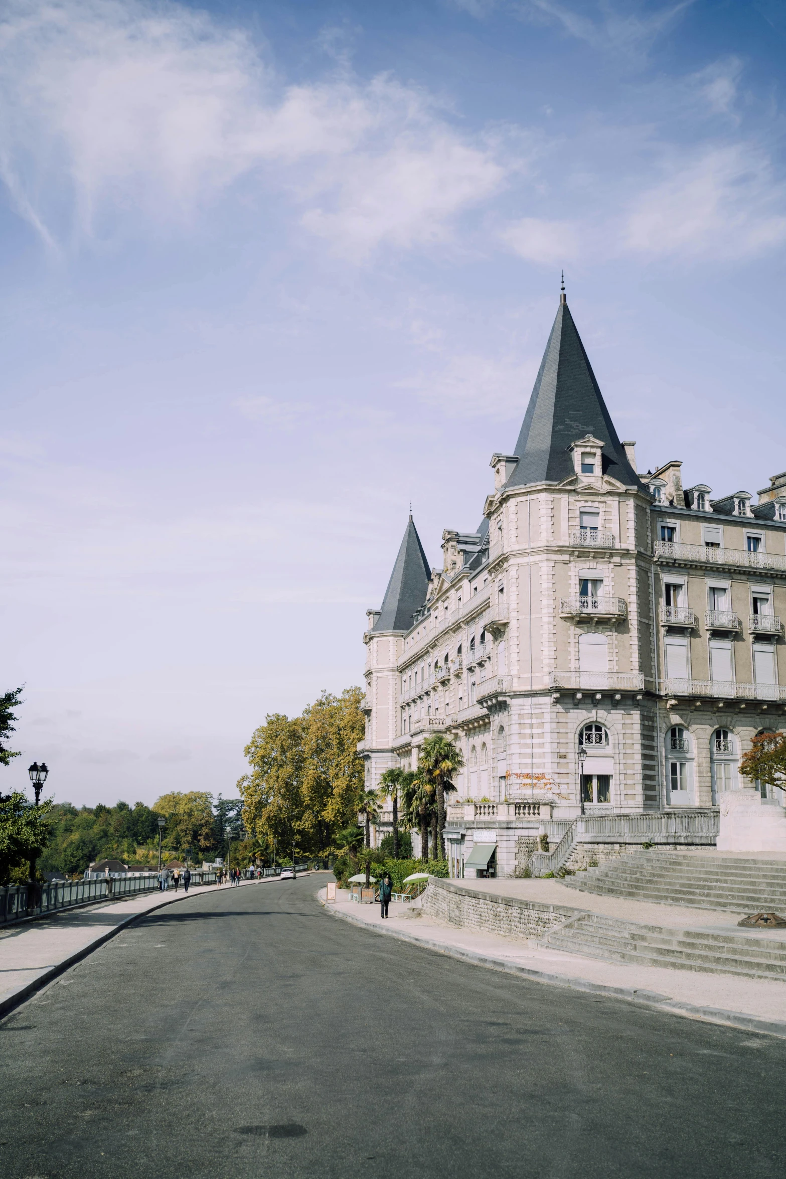 a large castle like building is situated in the distance