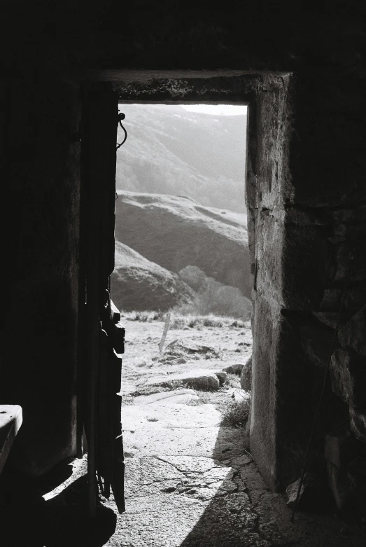 an empty door way in a stone building