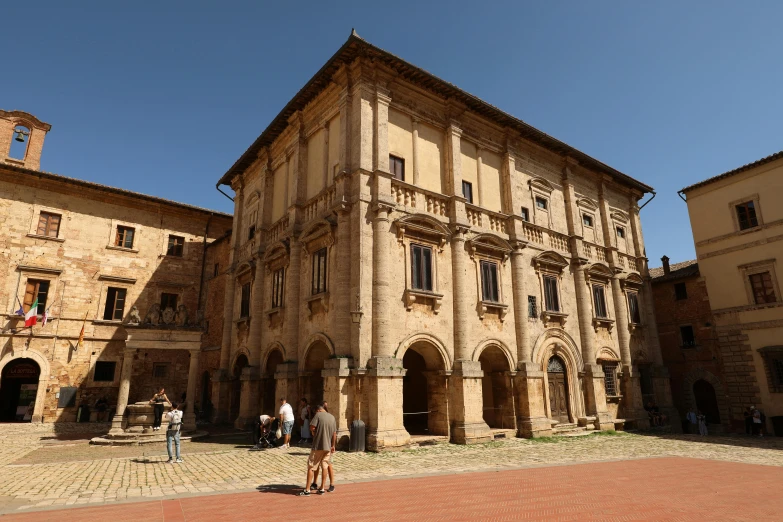 a large old house with a small courtyard