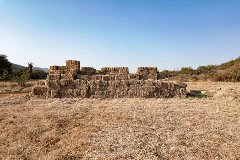 a pile of hay in the middle of nowhere