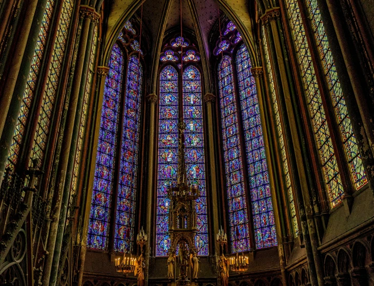 beautiful gothic - styled window with cross at center