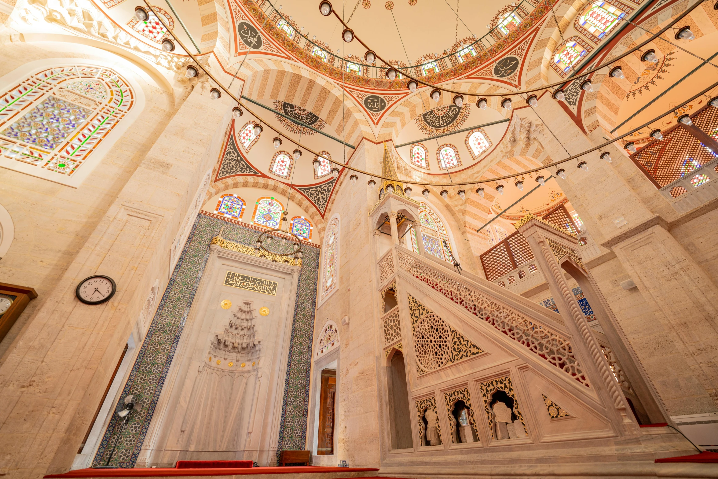 some decorations and windows decorate the ceiling of a building