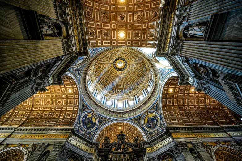 a circular picture looking up into the ceiling of an ornate building