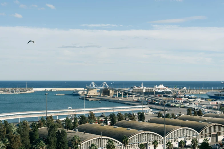 a view of the water and the pier from a distance