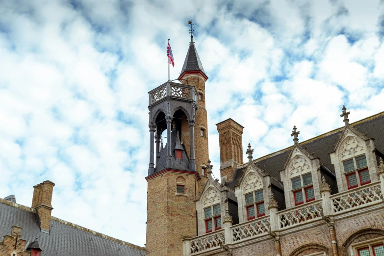 the building has a tall clock tower near the top