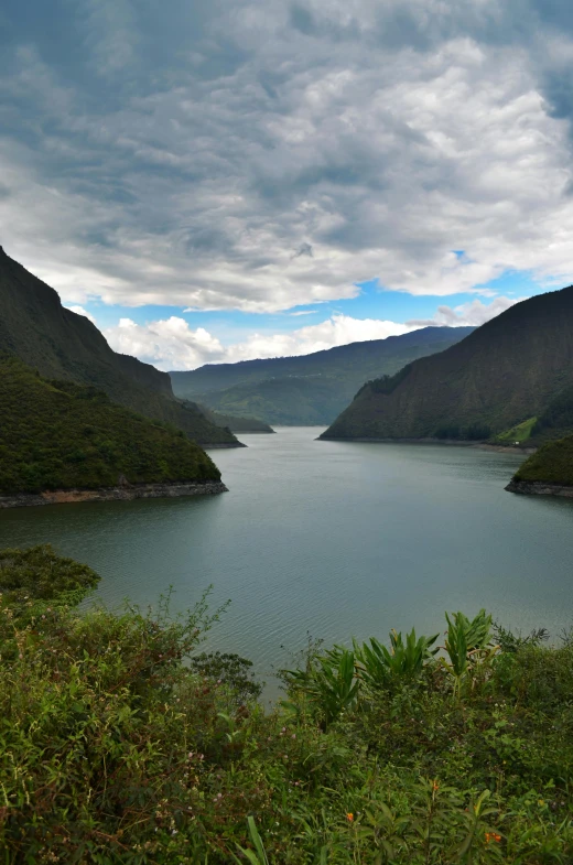 a large body of water surrounded by mountains