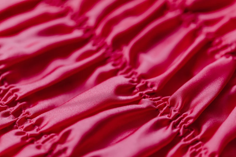 a close - up image of a pink cloth