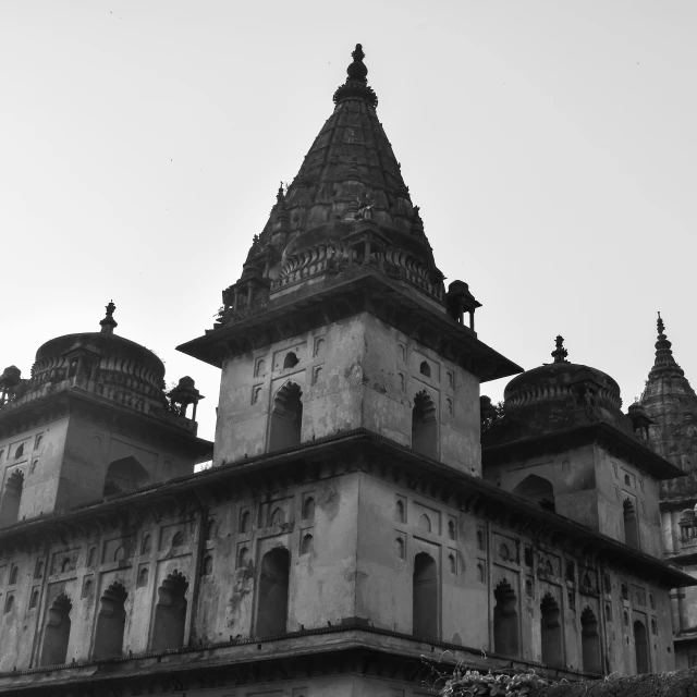 a black and white po of a building with two towers