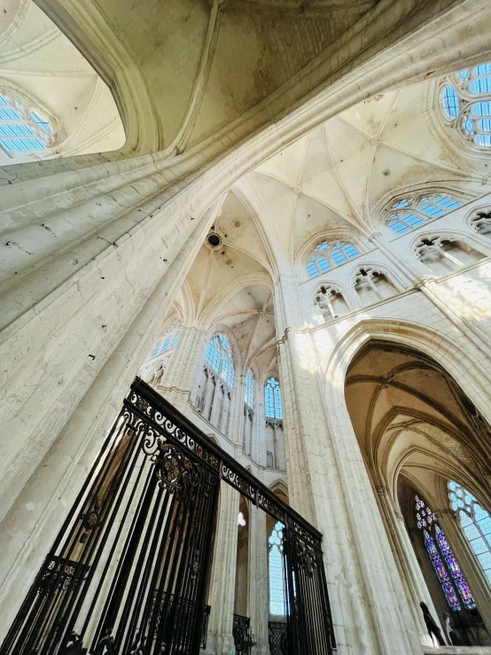 the vaulted ceiling and windows in a cathedral