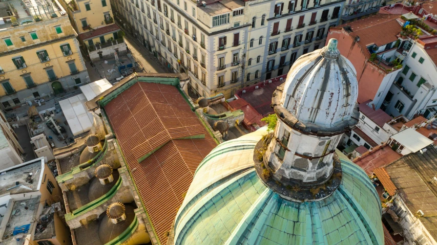 a cityscape of a very tall building in an aerial view