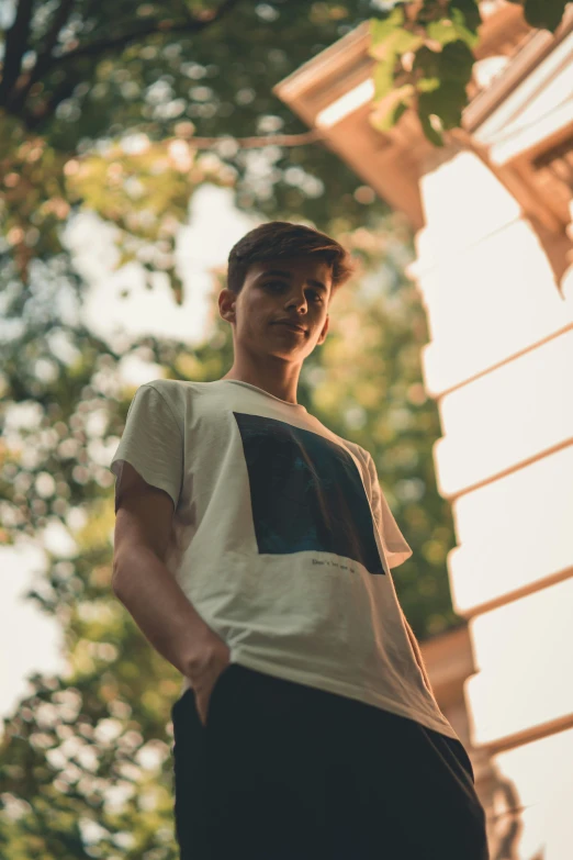 man with a white t - shirt and black shorts