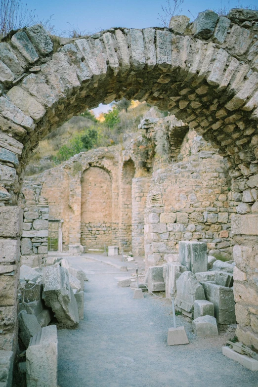 an old and deserted street, under an arch in the stone