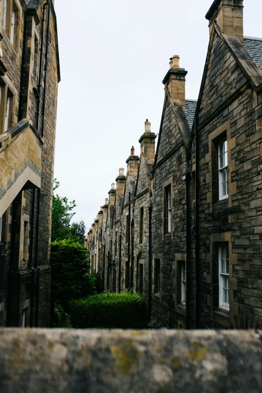 row of stone buildings on a cobbled street