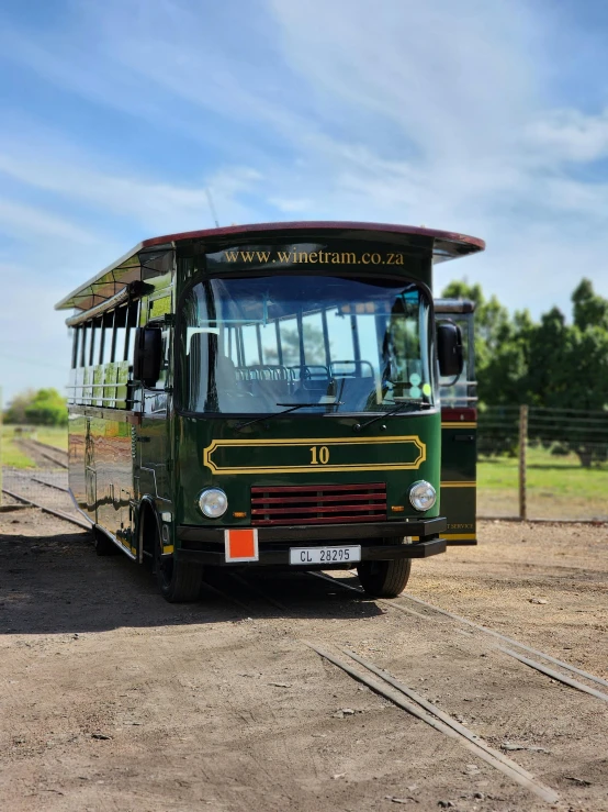 an old bus sitting on the side of the road