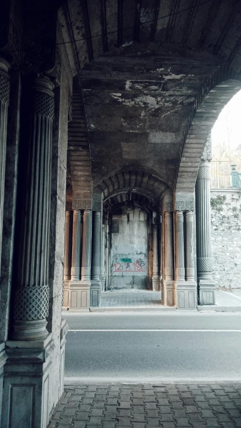 a long hallway is shown in an abandoned building