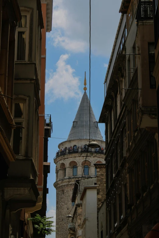 an old building with a spire and a tower