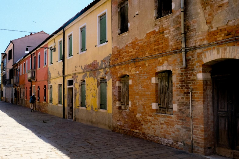 there are several windows on an old building