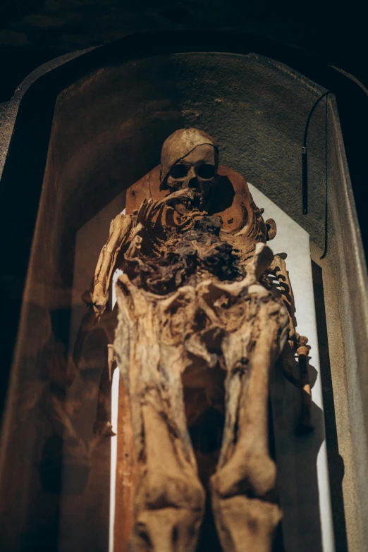 an old and scary looking figure in a museum